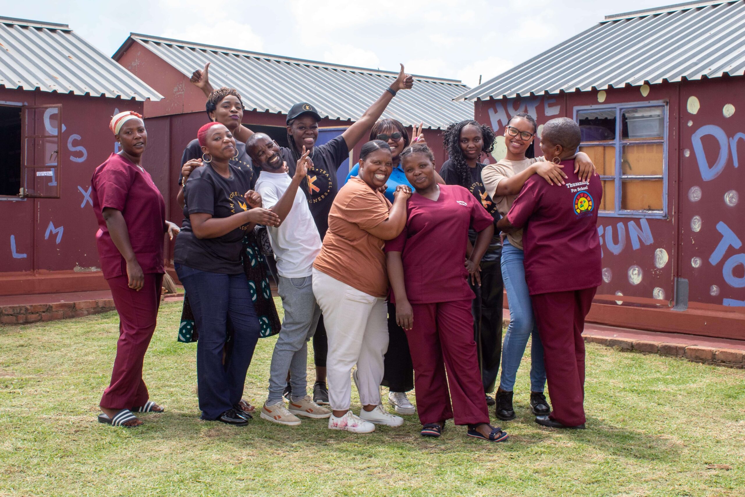Kamaroutes with the team at Thusanang